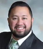 Dr. Villanueva smiling